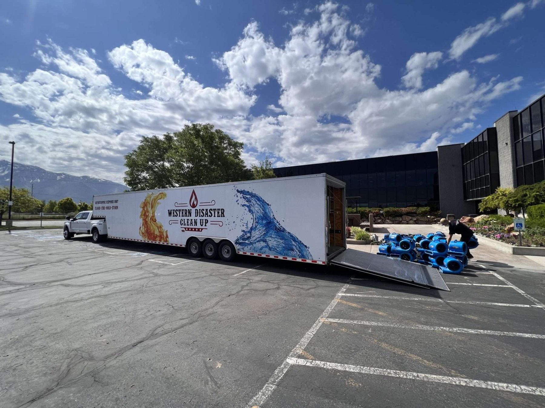 Air movers being unloaded from the response trailer
