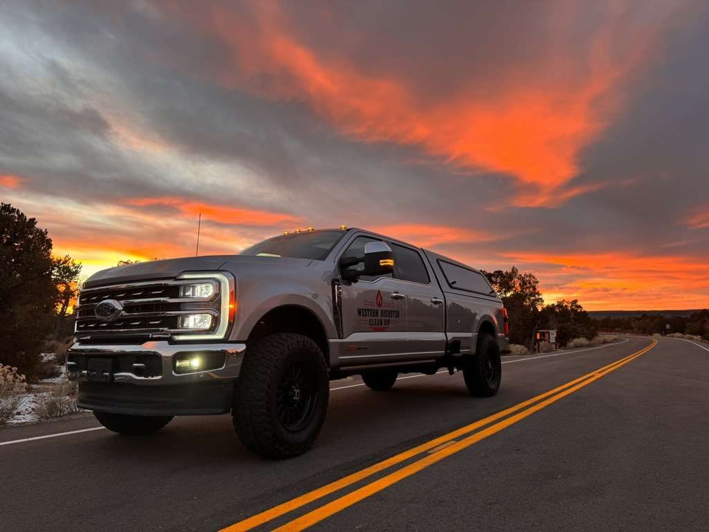 Western Disaster Clean Up service truck at sunset